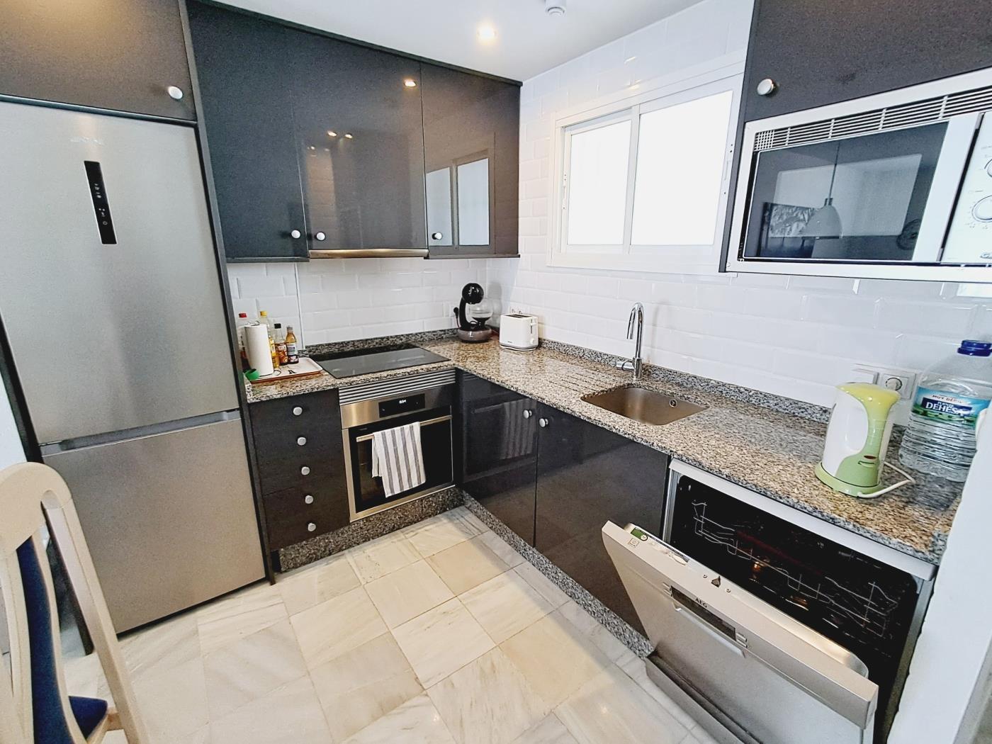 Elegante apartamento a pocos pasos de la playa. en Benalmádena