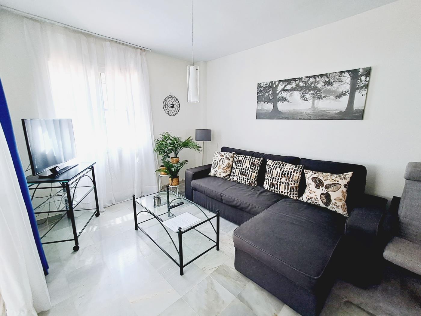Elegante apartamento a pocos pasos de la playa. en Benalmádena
