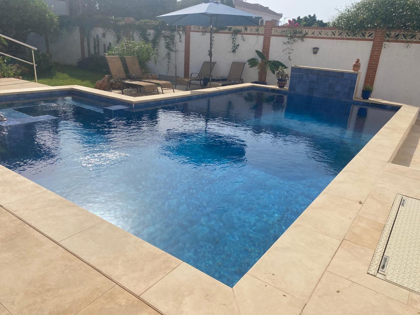 Encantadora villa de 4 dormitorios en Calle Cómpeta en Benalmádena