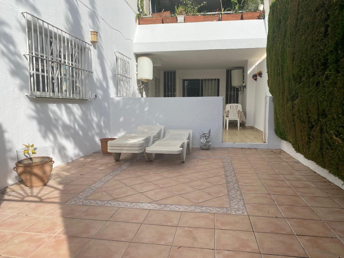 4 dorm apartamento con jardines in Benalmádena